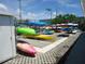 Community kayak storage with many kayaks available at 3128 59Th S St # 209, Gulfport, FL 33707