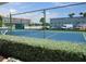 Well-maintained tennis court with chain link fence at 3128 59Th S St # 209, Gulfport, FL 33707