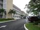 Exterior view of an apartment building with parking at 3128 59Th S St # 209, Gulfport, FL 33707