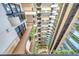 Aerial view of a multi-story building's atrium with balconies and greenery at 2413 Bayshore Blvd # 1501, Tampa, FL 33629