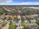 Aerial view showcasing a single-Gathering home in a residential neighborhood at 15810 Cobble Mill Dr, Wimauma, FL 33598