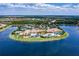 Community overview with lake and amenities at 15810 Cobble Mill Dr, Wimauma, FL 33598