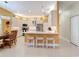 Modern kitchen with white cabinets, stainless steel appliances, and an island at 15810 Cobble Mill Dr, Wimauma, FL 33598