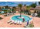 Circular spa pool surrounded by lounge chairs at 15810 Cobble Mill Dr, Wimauma, FL 33598