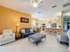 Spacious living room with comfortable seating and an open floor plan at 15810 Cobble Mill Dr, Wimauma, FL 33598