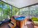 Enjoy this relaxing hot tub on the screened lanai at 15810 Cobble Mill Dr, Wimauma, FL 33598