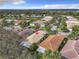 Aerial view showcasing a single-Gathering home in a residential neighborhood at 15810 Cobble Mill Dr, Wimauma, FL 33598