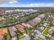 Aerial view showcasing a single-Gathering home in a residential neighborhood at 15810 Cobble Mill Dr, Wimauma, FL 33598