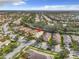 Aerial view showcasing a single-Gathering home in a residential neighborhood at 15810 Cobble Mill Dr, Wimauma, FL 33598
