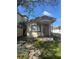 Cozy bungalow with front porch and small yard at 411 S Orleans Ave, Tampa, FL 33606