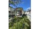 Quaint bungalow-style home with small yard at 411 S Orleans Ave, Tampa, FL 33606