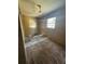 Simple bedroom with carpet and ceiling fan at 411 S Orleans Ave, Tampa, FL 33606