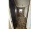 Small bedroom with wood paneling and closet at 411 S Orleans Ave, Tampa, FL 33606
