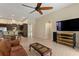 Bright living room with hardwood floors and sliding glass doors at 3320 Majestic View Dr, Lutz, FL 33558
