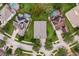 Aerial view of a house nestled in a residential neighborhood at 3320 Majestic View Dr, Lutz, FL 33558