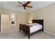Comfortable bedroom with access to bathroom and ample closet space at 3320 Majestic View Dr, Lutz, FL 33558