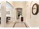 Bright and spacious entryway with tile flooring and archways at 3320 Majestic View Dr, Lutz, FL 33558