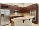Modern kitchen with stainless steel appliances and granite countertops at 3320 Majestic View Dr, Lutz, FL 33558