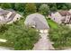 Aerial view of a single-Gathering home with a three-car garage at 3320 Majestic View Dr, Lutz, FL 33558