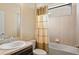 Clean bathroom with tub shower combination and updated vanity at 3320 Majestic View Dr, Lutz, FL 33558