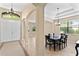 Formal dining room with a table for six and neutral decor at 3320 Majestic View Dr, Lutz, FL 33558
