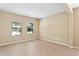 Light and airy living room with neutral walls and tile flooring at 3320 Majestic View Dr, Lutz, FL 33558