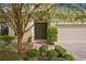 Inviting front entry with double doors and a brick walkway at 3320 Majestic View Dr, Lutz, FL 33558