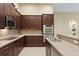 Modern kitchen with stainless steel appliances and ample cabinetry at 3320 Majestic View Dr, Lutz, FL 33558