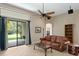 Comfortable living room with leather couch and large windows at 3320 Majestic View Dr, Lutz, FL 33558