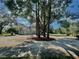 Large driveway, basketball court, and home view at 168 Rue Des Chateaux, Tarpon Springs, FL 34688