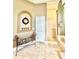 Bathroom with shower, toilet and decorative bench at 168 Rue Des Chateaux, Tarpon Springs, FL 34688