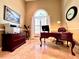 Home office with hardwood floors, large windows, and classic furnishings at 168 Rue Des Chateaux, Tarpon Springs, FL 34688