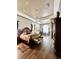 Spacious Primary bedroom with king-size bed and hardwood floors at 168 Rue Des Chateaux, Tarpon Springs, FL 34688