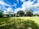 Home with large lot and trees at 168 Rue Des Chateaux, Tarpon Springs, FL 34688
