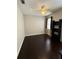 Bright bedroom with dark wood floors and ample closet space at 11919 Royce Waterford Cir, Tampa, FL 33626