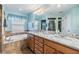 Elegant bathroom with double vanity, soaking tub, and separate shower at 1002 Pondview Ct, Tarpon Springs, FL 34689