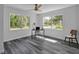 Home office with hardwood floors and large windows providing natural light at 12020 82Nd E St, Parrish, FL 34219