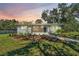 Newly renovated home with a modern facade and landscaped front yard at 12020 82Nd E St, Parrish, FL 34219