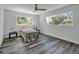 Spacious bedroom with gray flooring and large windows at 12020 82Nd E St, Parrish, FL 34219