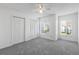 Bright bedroom with gray carpeting and double door closet at 1326 Twilridge Pl, Brandon, FL 33511