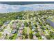 Aerial view of a neighborhood near a lake at 206 Lexington St, Oldsmar, FL 34677