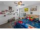 bedroom featuring a ceiling fan and plenty of storage at 8720 Savory Walk Dr, Land O Lakes, FL 34637