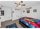 bedroom with double bed, carpet, and ample closet space at 8720 Savory Walk Dr, Land O Lakes, FL 34637
