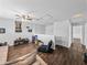 Bonus room with wood flooring, ceiling fan, and built-in shelving at 8720 Savory Walk Dr, Land O Lakes, FL 34637