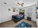 bedroom with superhero themed decor at 8720 Savory Walk Dr, Land O Lakes, FL 34637