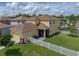 Aerial view of two-story house with fenced backyard at 8720 Savory Walk Dr, Land O Lakes, FL 34637