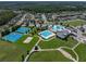 Community overview showing pools, tennis and basketball courts at 8720 Savory Walk Dr, Land O Lakes, FL 34637