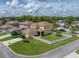 Aerial view showing house location and neighborhood at 8720 Savory Walk Dr, Land O Lakes, FL 34637