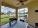 Spacious screened porch overlooking backyard at 8720 Savory Walk Dr, Land O Lakes, FL 34637