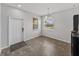 Bright dining room with tile floors and a chandelier at 8720 Savory Walk Dr, Land O Lakes, FL 34637
